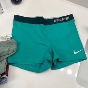 Nike Pro teal/sea foam green spandex shorts